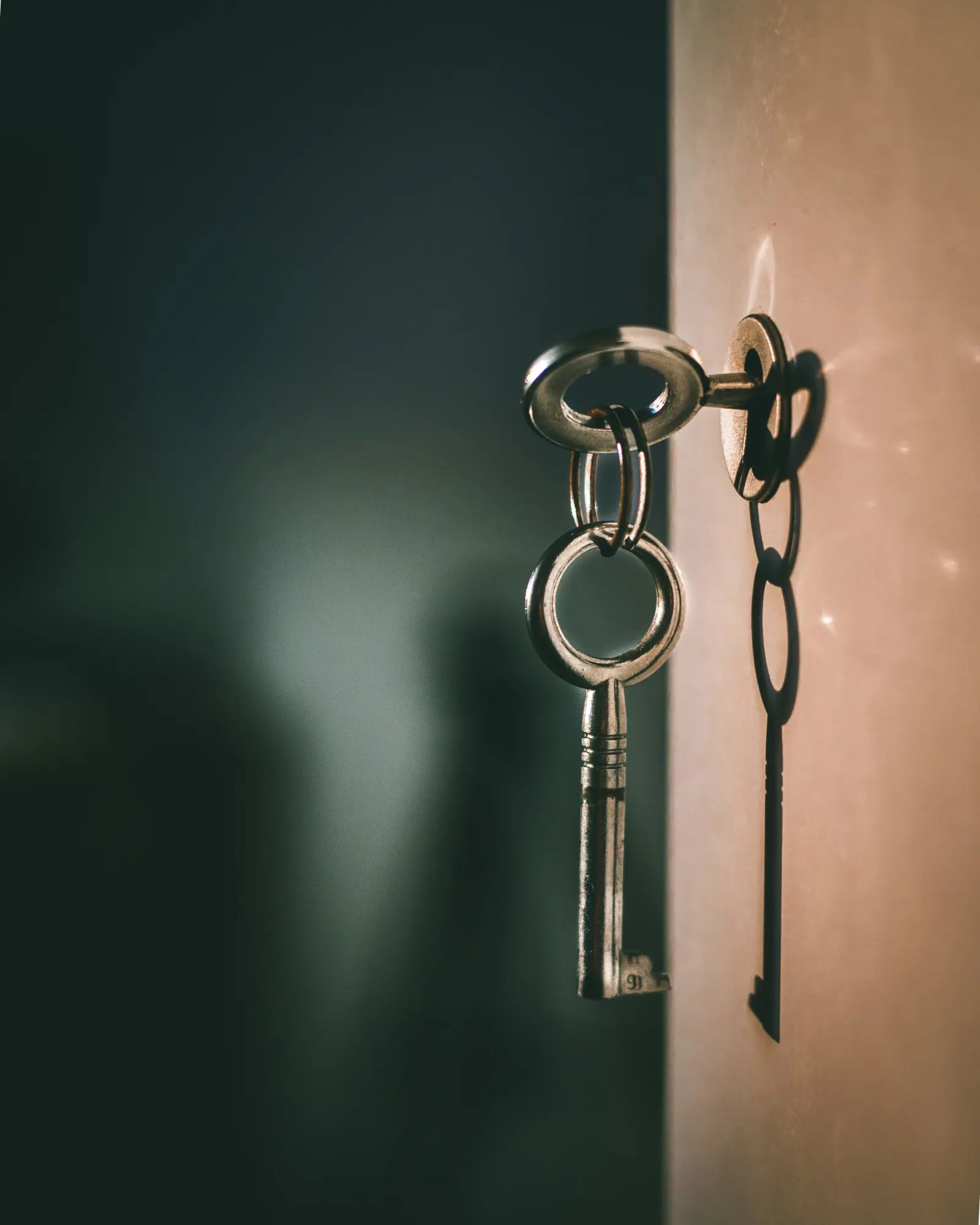 Old metal key left in a door lock