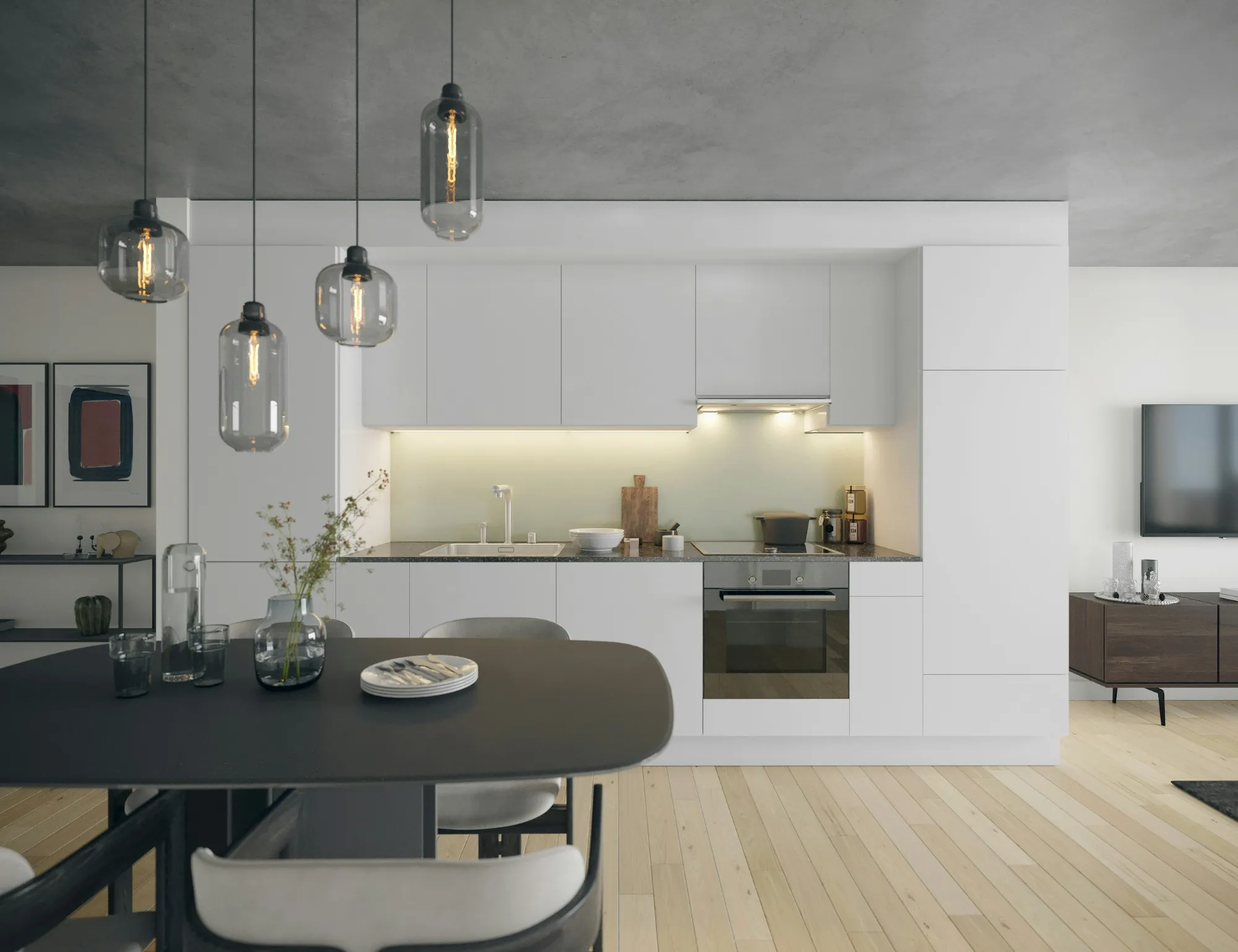 White kitchen with smoked glass pendant lights over a dining table